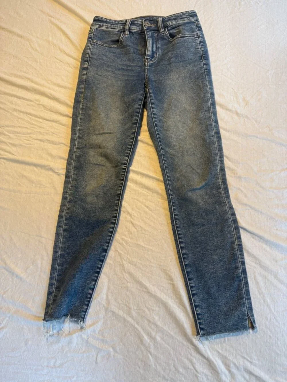 American Eagle hi Rise Jeans Size 4 Medium Blue Cotton Spandex Jeggings Raw Hem